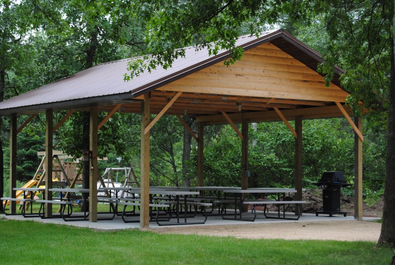 Pavilion with picnic tables and grills.