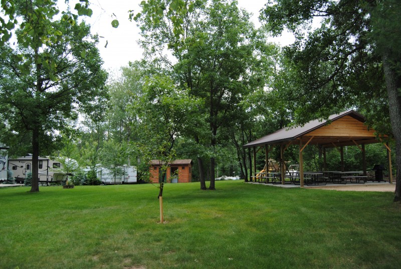 RV Campers, Resort lawn, and covered Pavilion.
