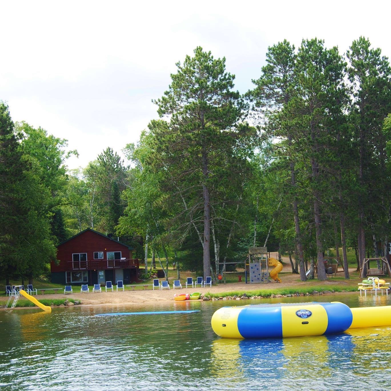 Inflatable trampoline on the lake.